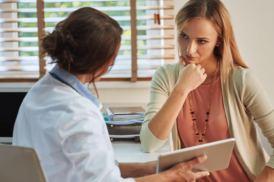 doctor consulting patient on where to get tested for std's 
